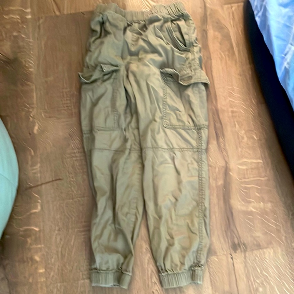 Cargo pants in a light green color. (Tag info including size and brand in photo)